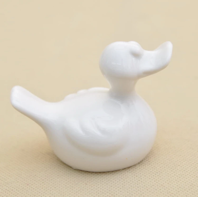 24009-1 KACZKA CERAMIKA BIAŁA H 7*10 CM OP.6 SZT